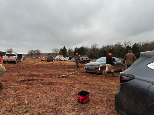 The parking area became a muddy mess on Friday afternoon!